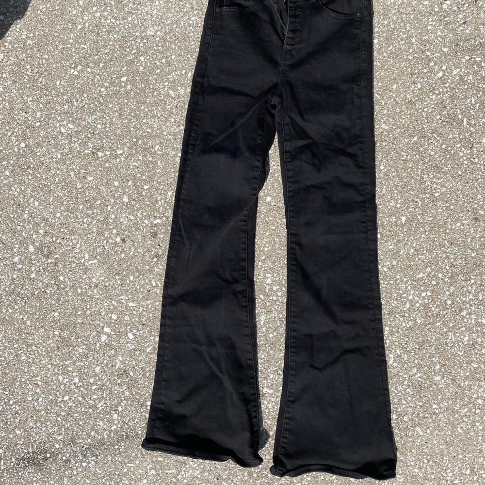 High rise exposed button up flare American eagle jeans